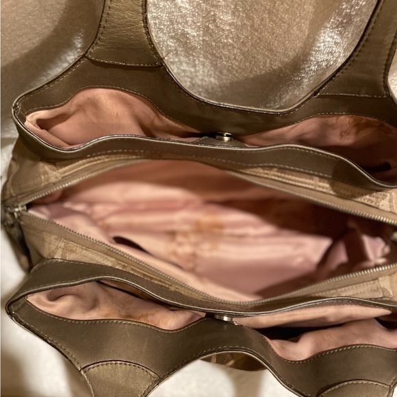 Coach signature purse has lots of pockets still in good condition. - Picture 11 of 11